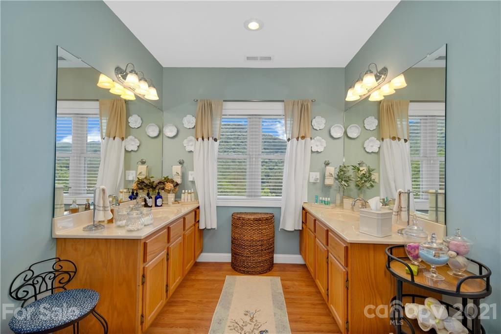 253 Benitez Way Clyde, NC 28721 - Photo 33 of 40 a kitchen with a table and chairs in it