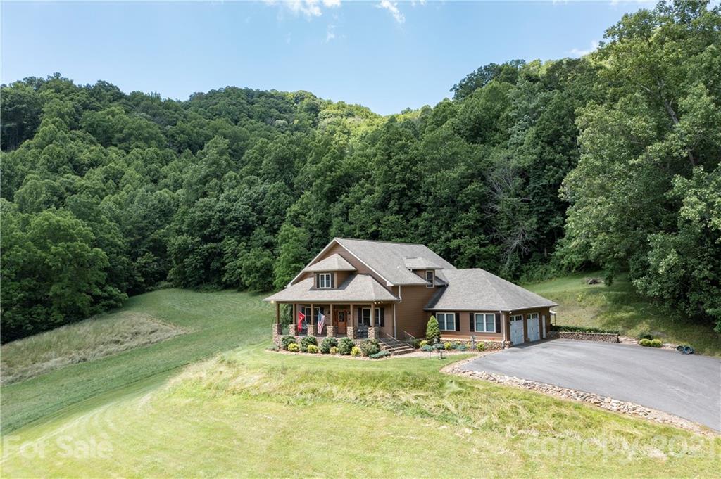 253 Benitez Way Clyde, NC 28721 - Photo 38 of 40 an aerial view of a house