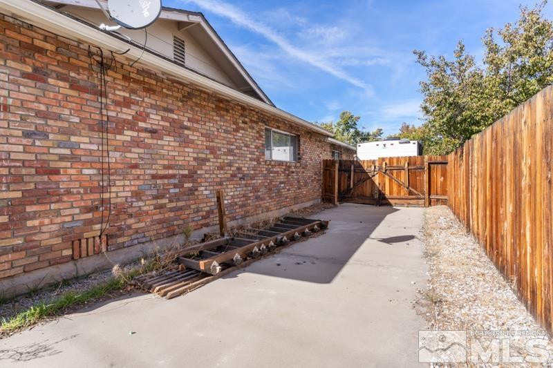 613 Ivy Street Carson City, NV 89703 - Photo 23 of 25 a view of a pathway with a backyard