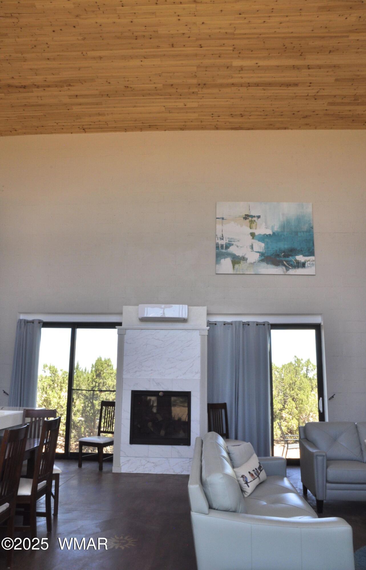 12 County Road Concho, AZ 85924 - Photo 11 of 85 Pacific Red Cedar Vaulted Ceilings, Solar Electric Mini-Split & Heatilator Propane Fireplace