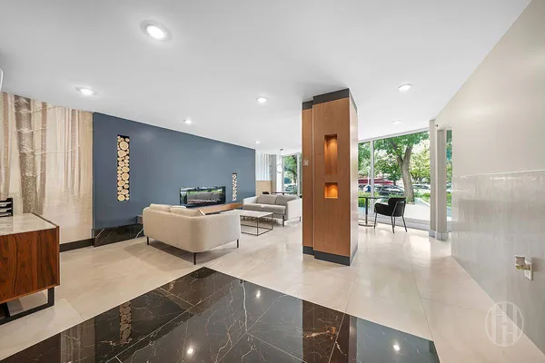 a room with gym equipment and large mirror
