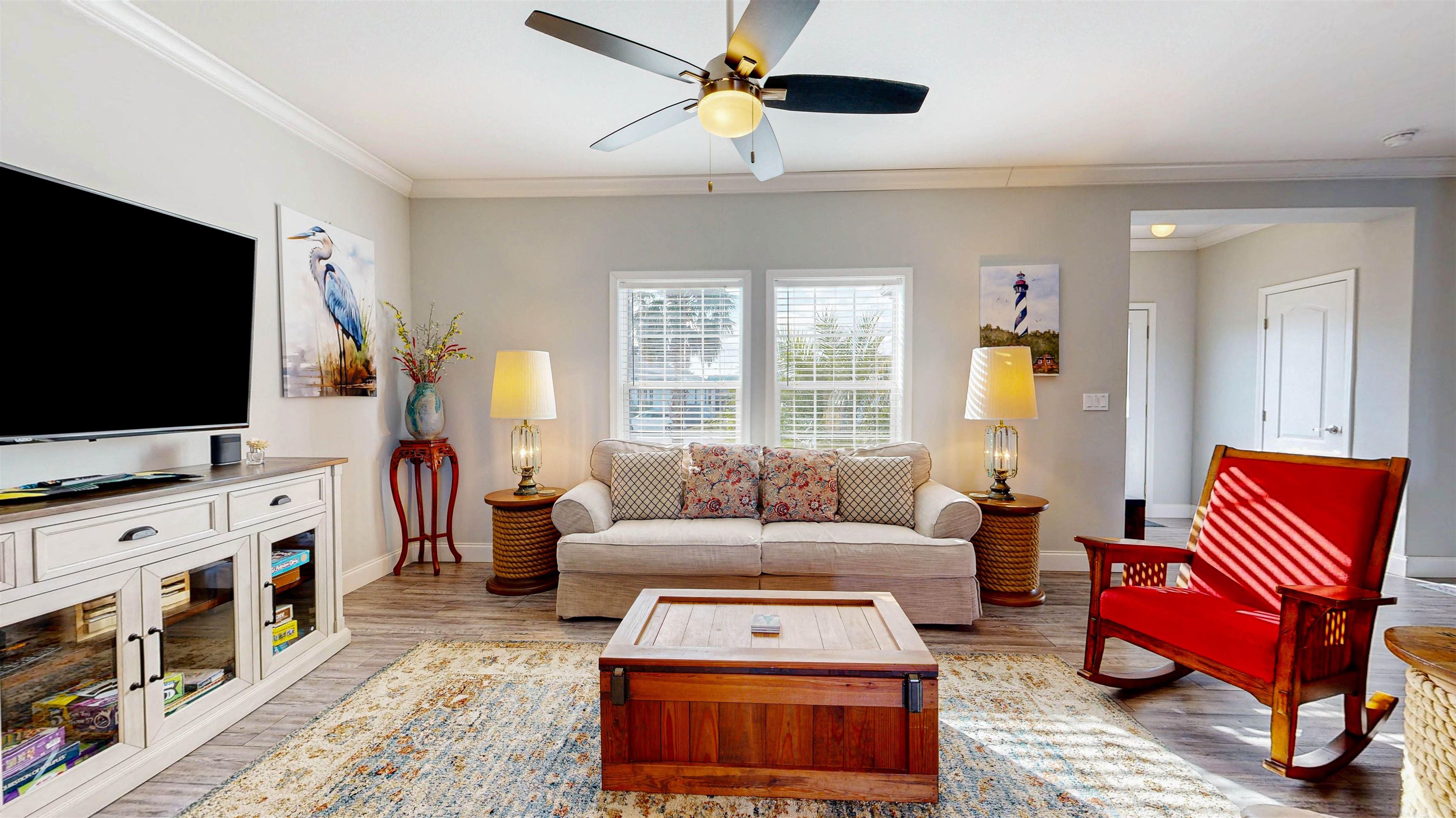 5910 Rio Royalle Road St. Augustine, FL 32080 - Photo 11 of 48 a living room with furniture and a flat screen tv