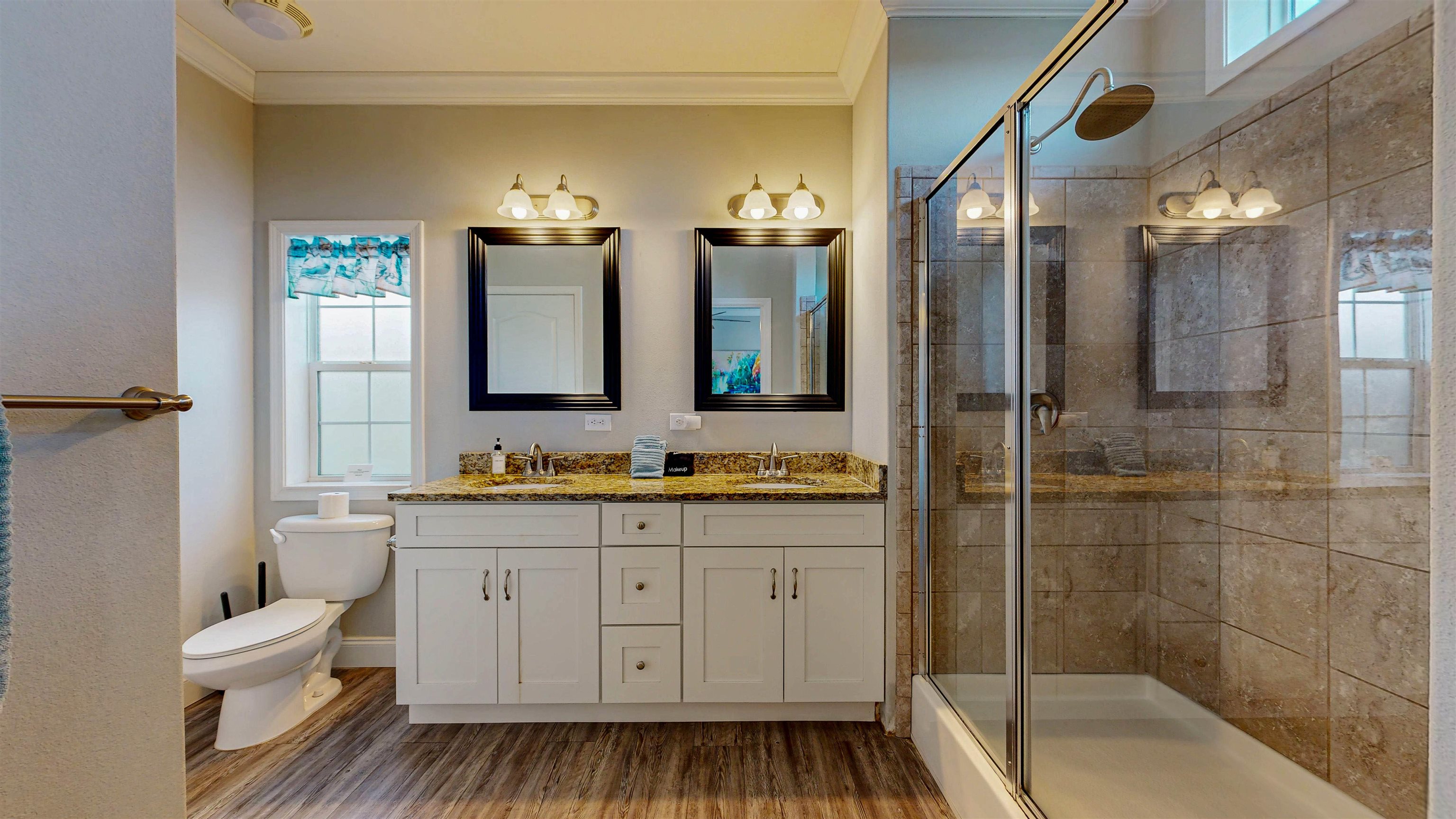 5910 Rio Royalle Road St. Augustine, FL 32080 - Photo 26 of 48 a bathroom with a sink a toilet and shower
