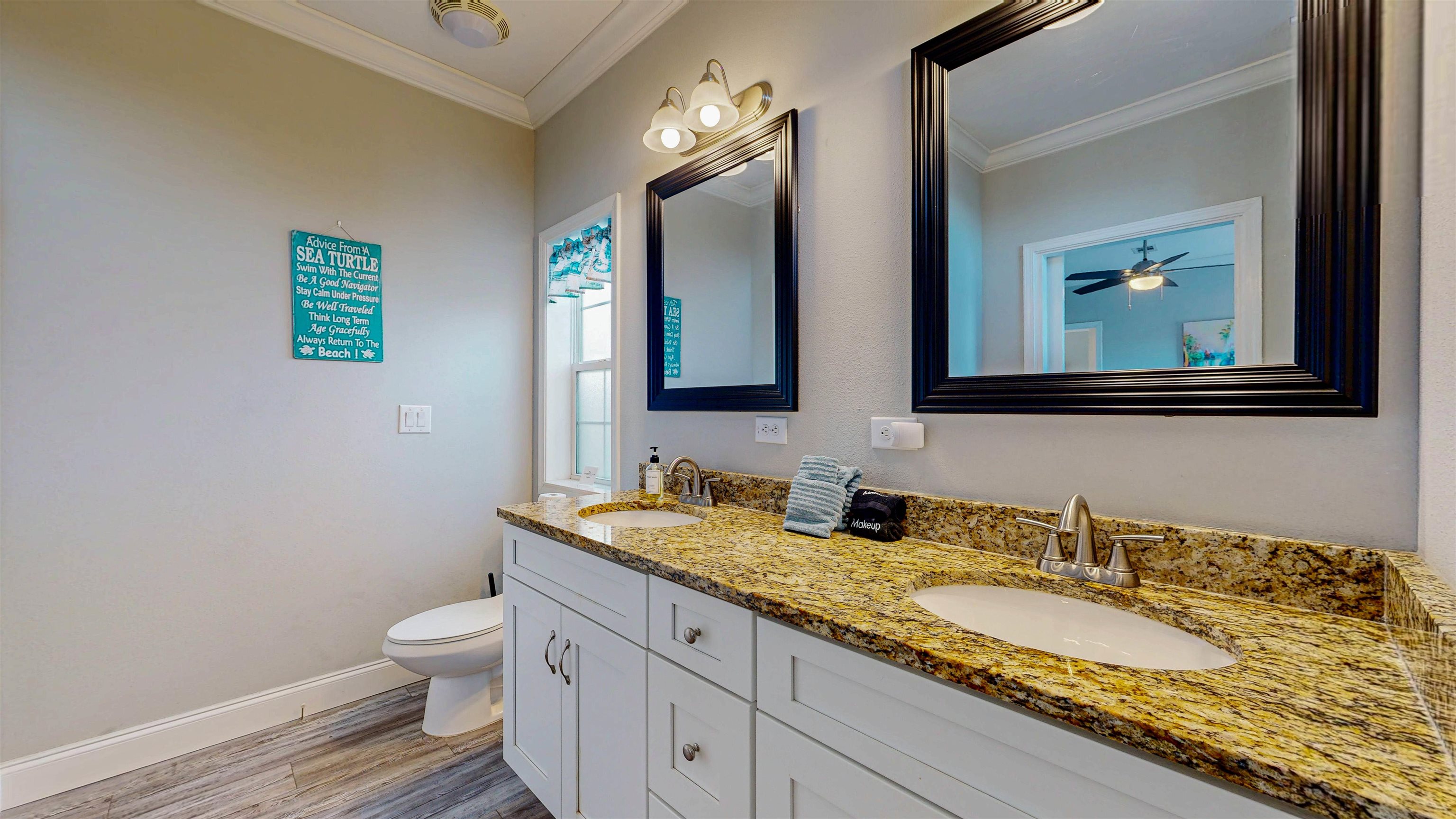 5910 Rio Royalle Road St. Augustine, FL 32080 - Photo 27 of 48 a bathroom with a granite countertop sink and a mirror