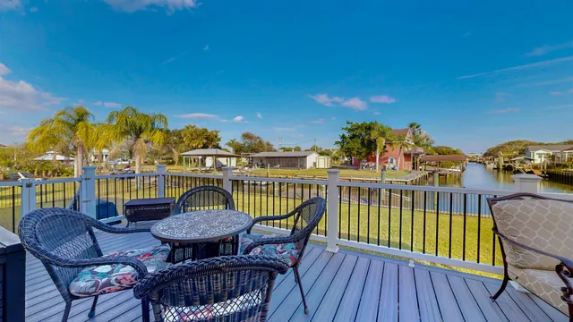 a view of a chairs on the roof deck