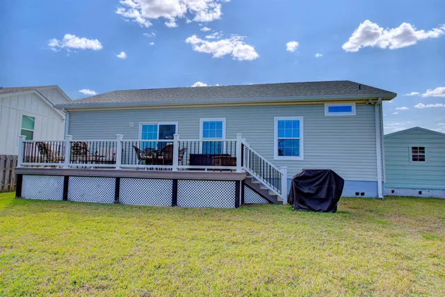 a view of a swimming pool with lounge chair