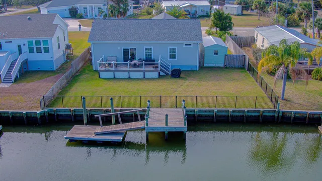 a view of a balcony with chairs