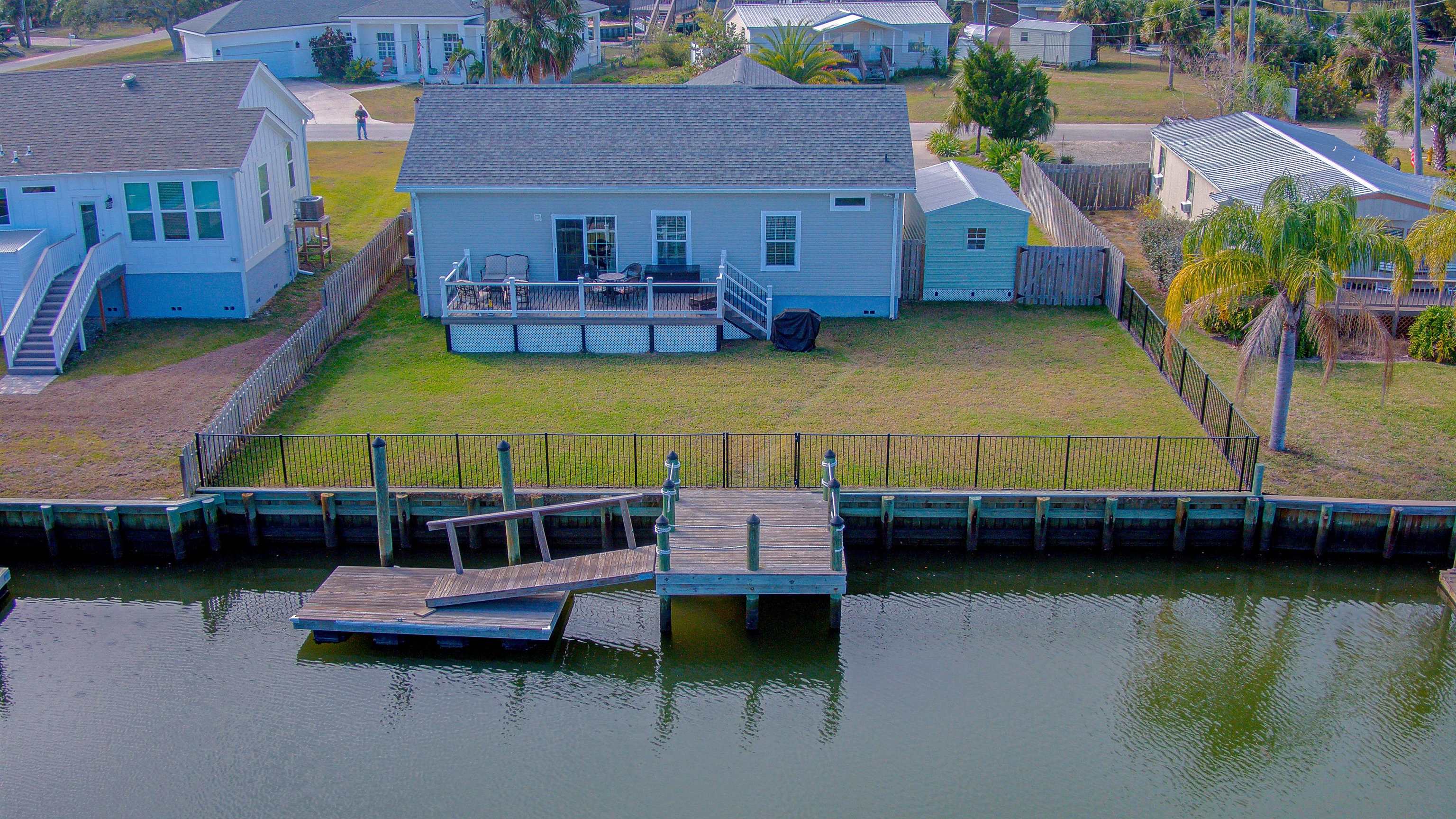 5910 Rio Royalle Road St. Augustine, FL 32080 - Photo 40 of 48 a view of a swimming pool with lounge chair