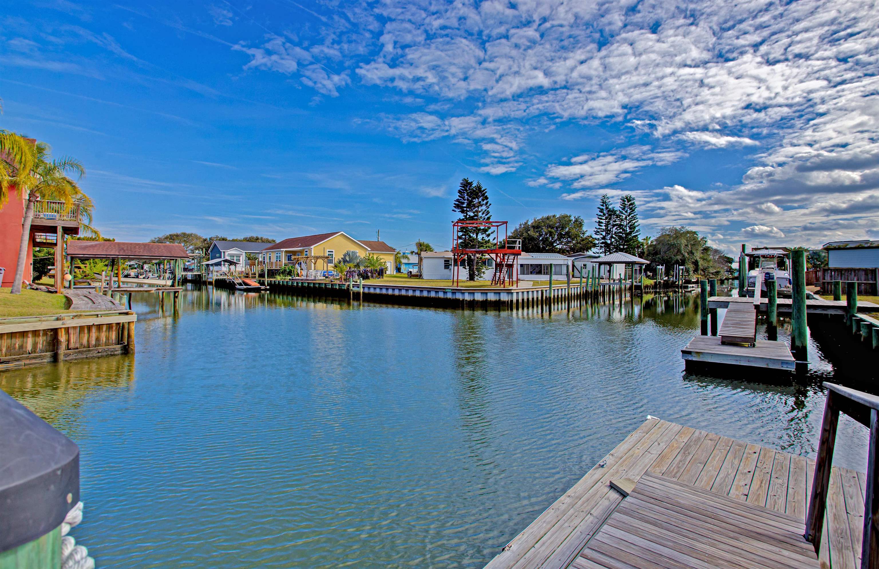 5910 Rio Royalle Road St. Augustine, FL 32080 - Photo 4 of 48 a view of a lake with a house