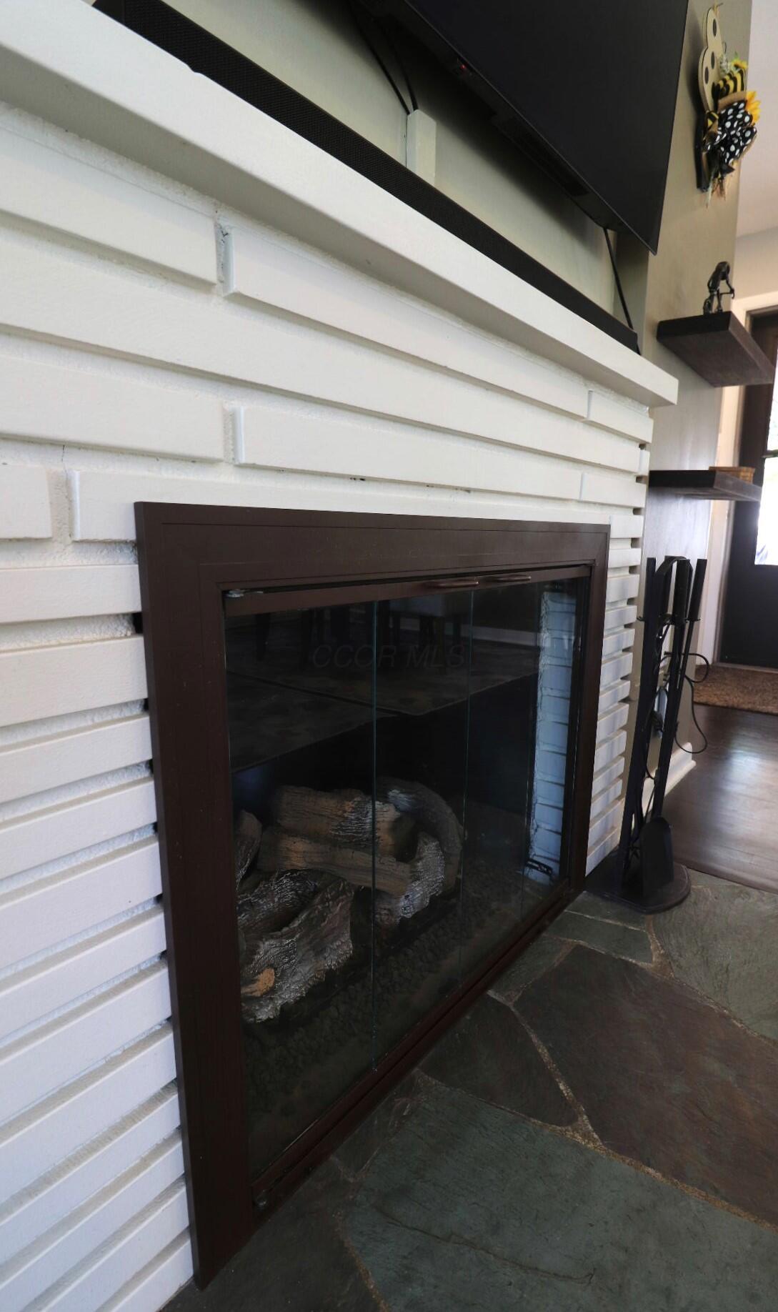1950 Langham Road Columbus, OH 43221 - Photo 14 of 56 New fireplace doors added 2023