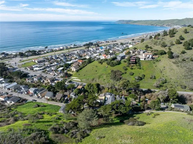 an aerial view of beach and ocean