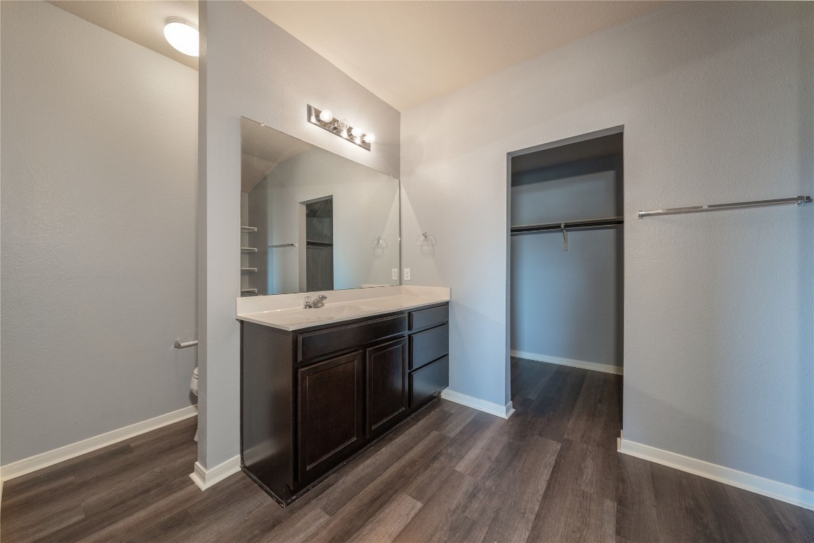 414 Pentire Way Hutto, TX 78634 - Photo 16 of 26 a kitchen with a sink and a refrigerator