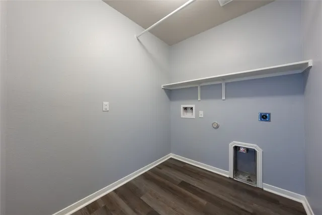 a room with a table and mirror