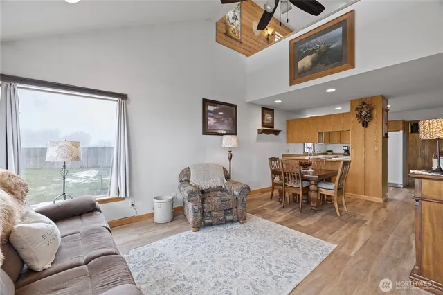 a living room with furniture and a table