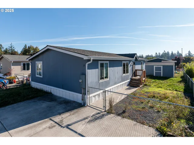 a house view with a backyard space