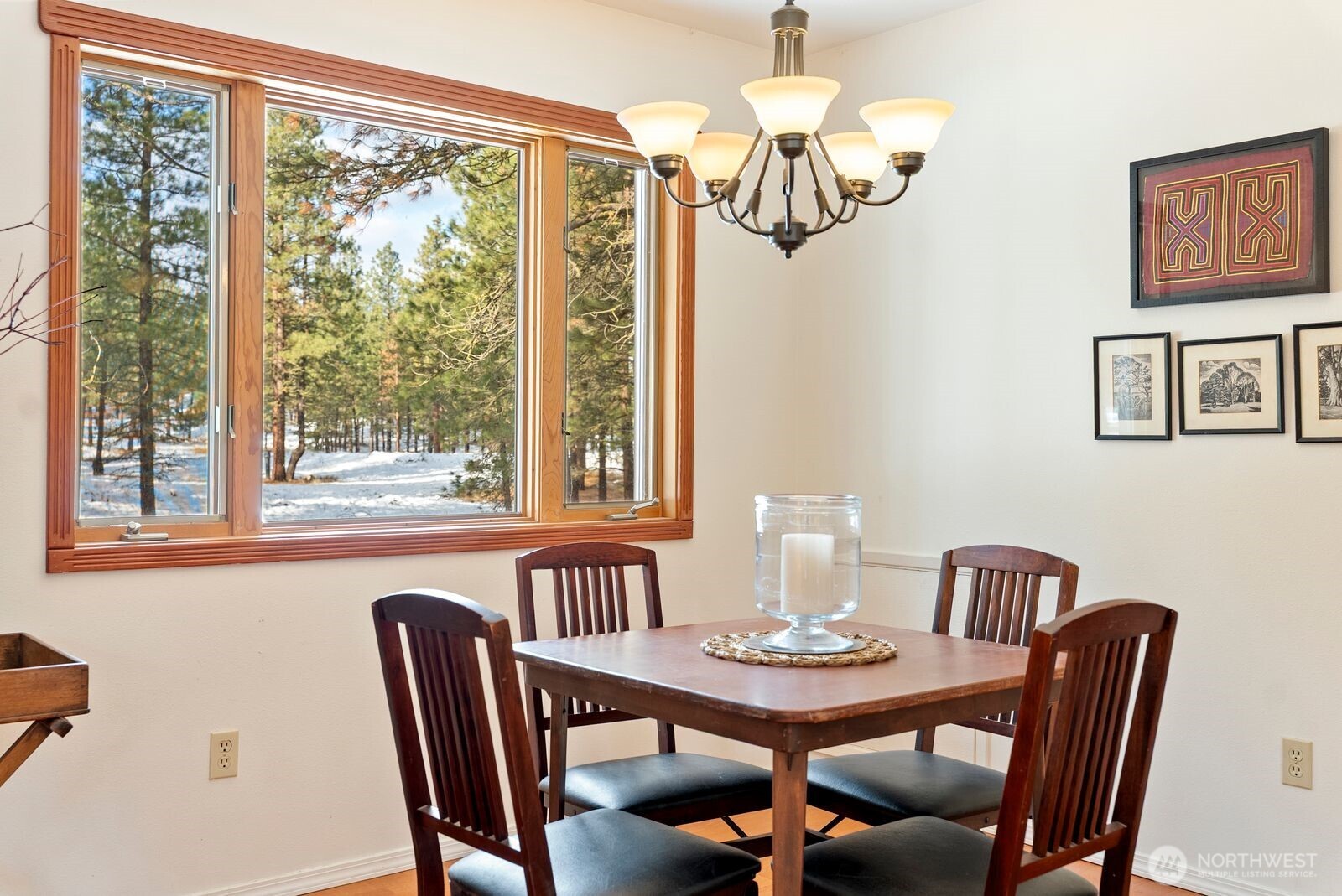 5 Chase Road Winthrop, WA 98862 - Photo 26 of 40 a view of a dining room with furniture a chandelier and a window