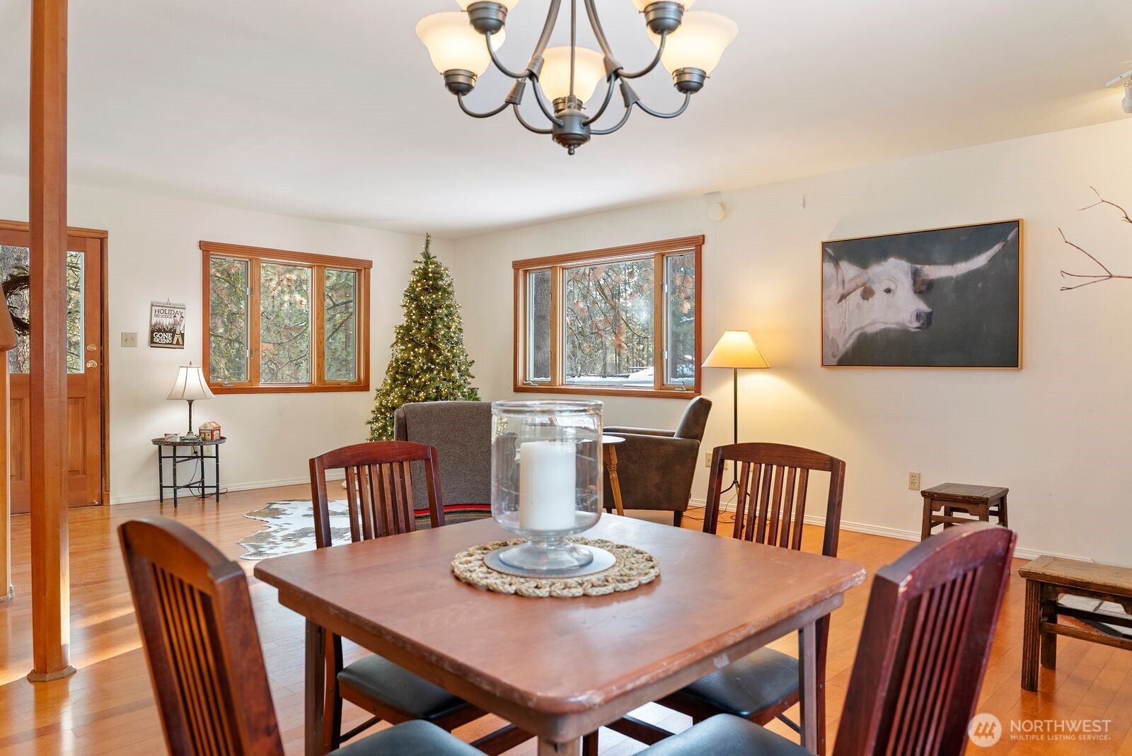 5 Chase Road Winthrop, WA 98862 - Photo 7 of 40 a view of a dining room with furniture window and wooden floor