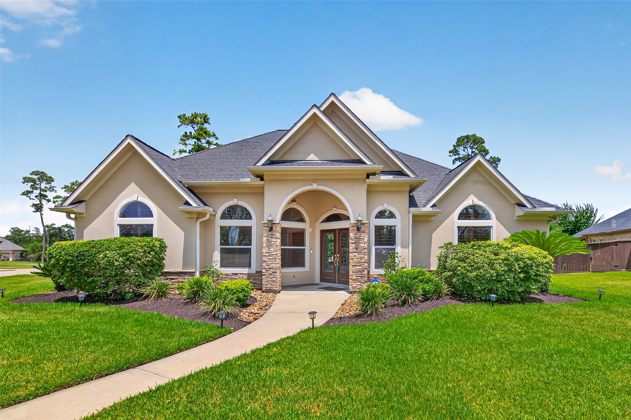8114 Hideaway Run Way Spring, TX 77389 - Photo 5 of 37 The impressive front yard is just a little preview—this home has plenty more surprises waiting inside!