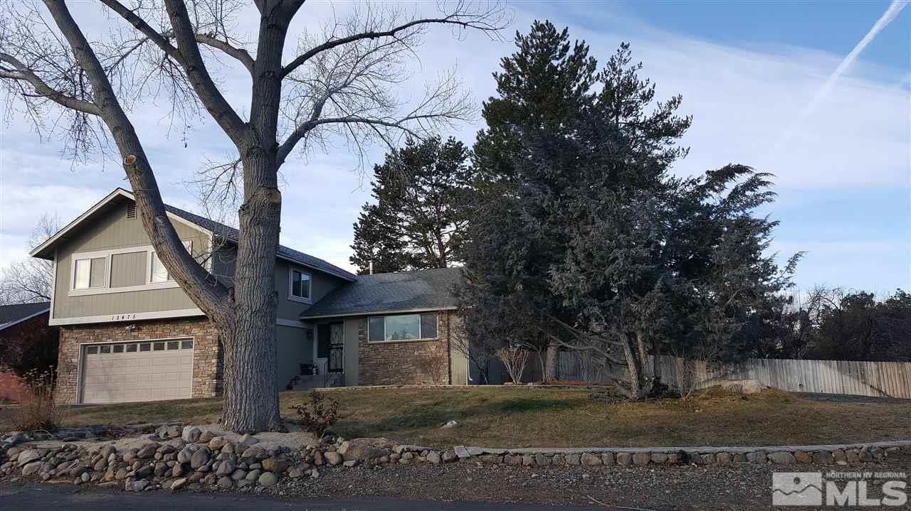 12475 Overbrook Drive Reno, NV 89511 - Photo 3 of 6 a view of a house with a yard