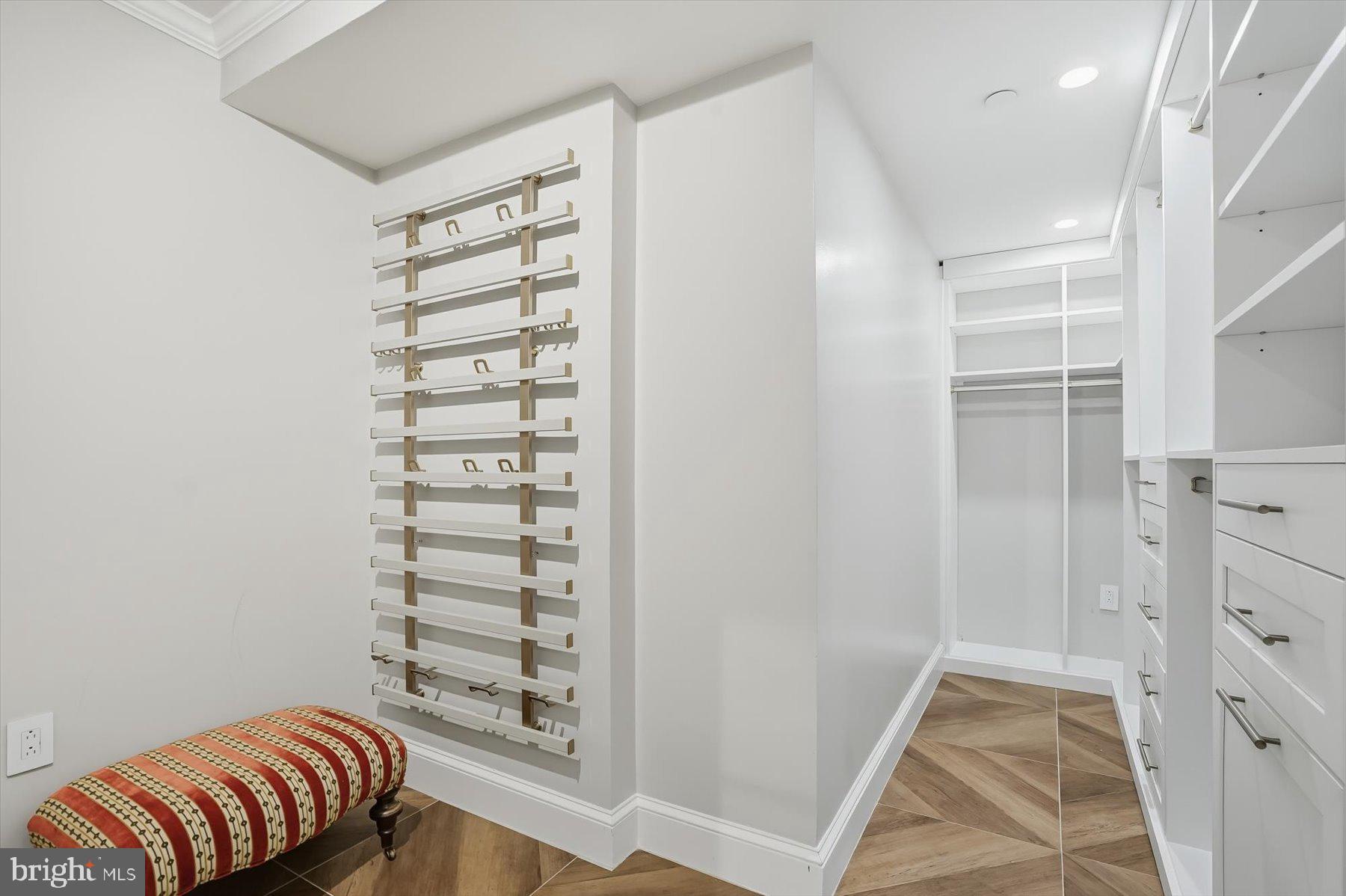 701 Pennsylvania Avenue Northwest, Unit PH21 Washington, DC 20004 - Photo 14 of 18 a view of room with walk in closet and window