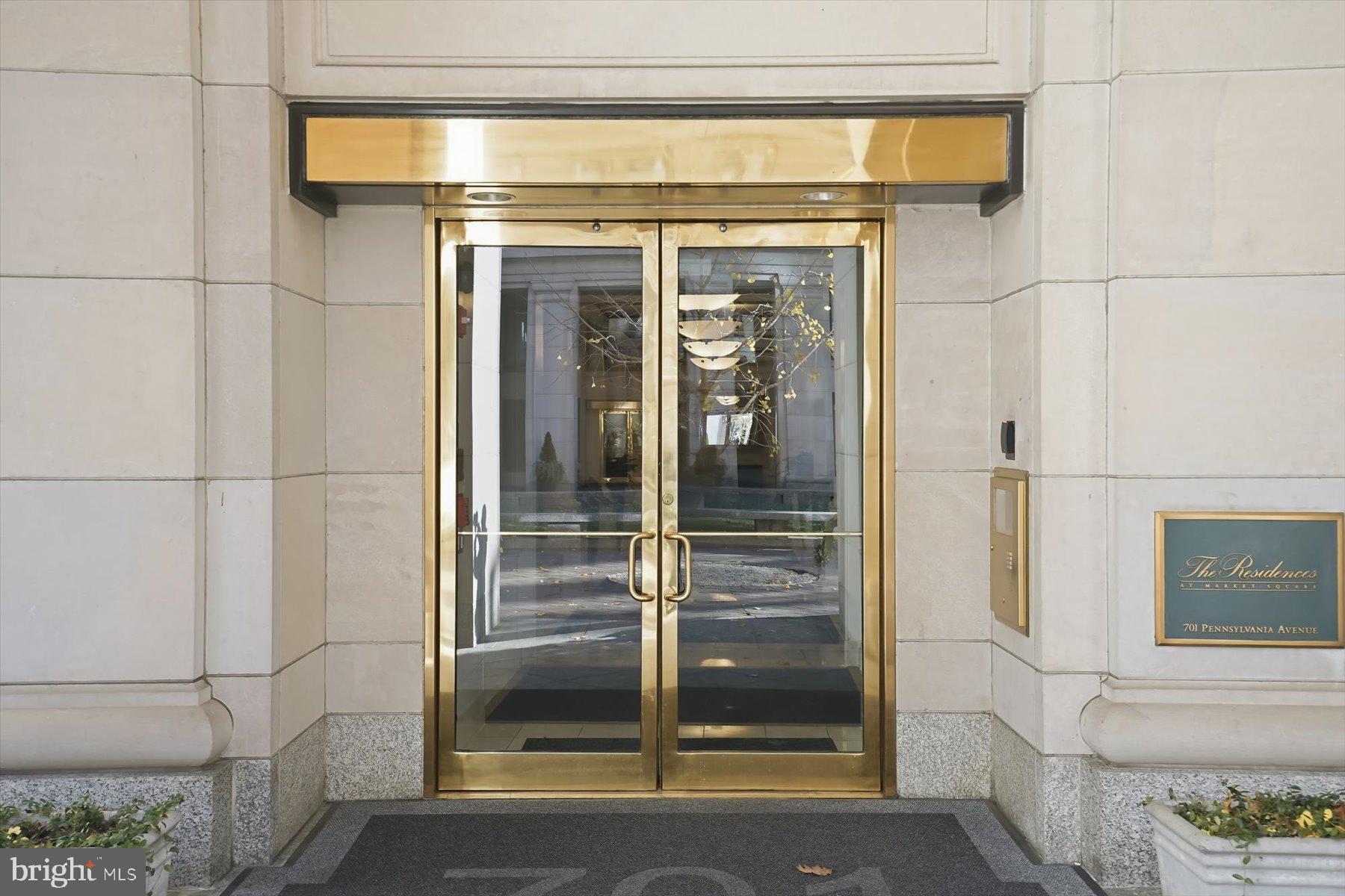 701 Pennsylvania Avenue Northwest, Unit PH21 Washington, DC 20004 - Photo 2 of 18 a bathroom with a glass shower door