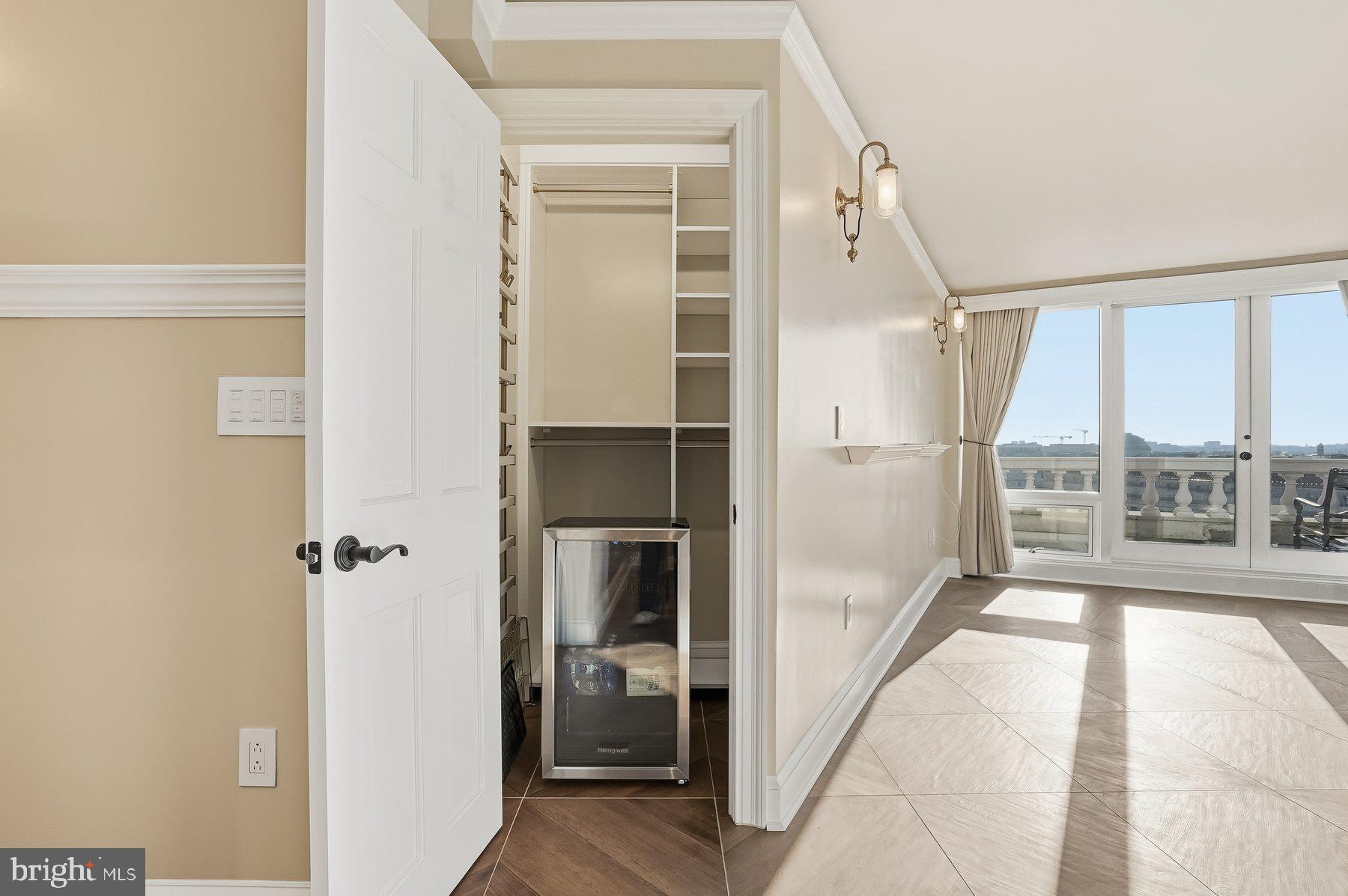 701 Pennsylvania Avenue Northwest, Unit PH21 Washington, DC 20004 - Photo 10 of 18 a view of entry way with wooden door