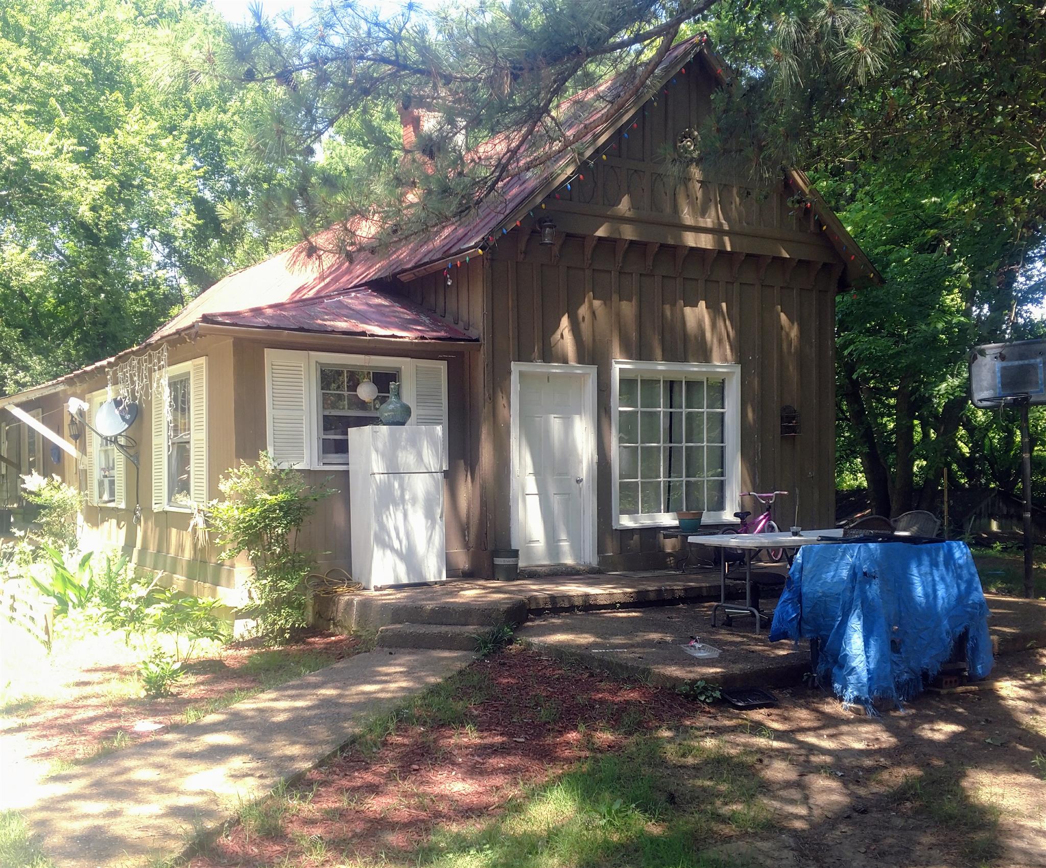 3580 Bell Road Nashville, TN 37214 - Photo 10 of 12 a front view of a house with a garden