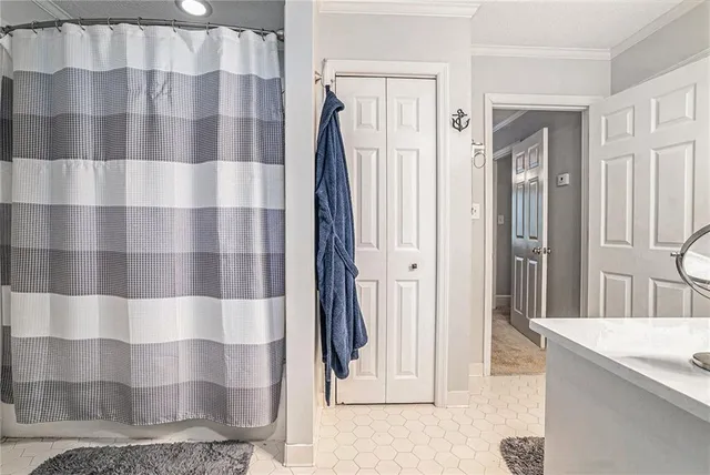a bathroom with a sink and a shower
