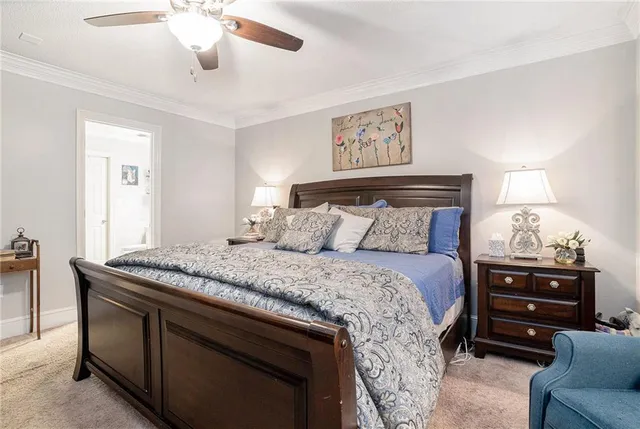 a bedroom with a bed and furniture