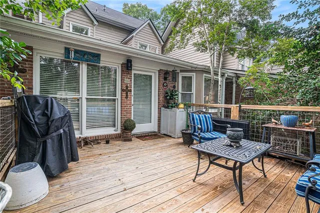 a view of a chairs on the roof deck