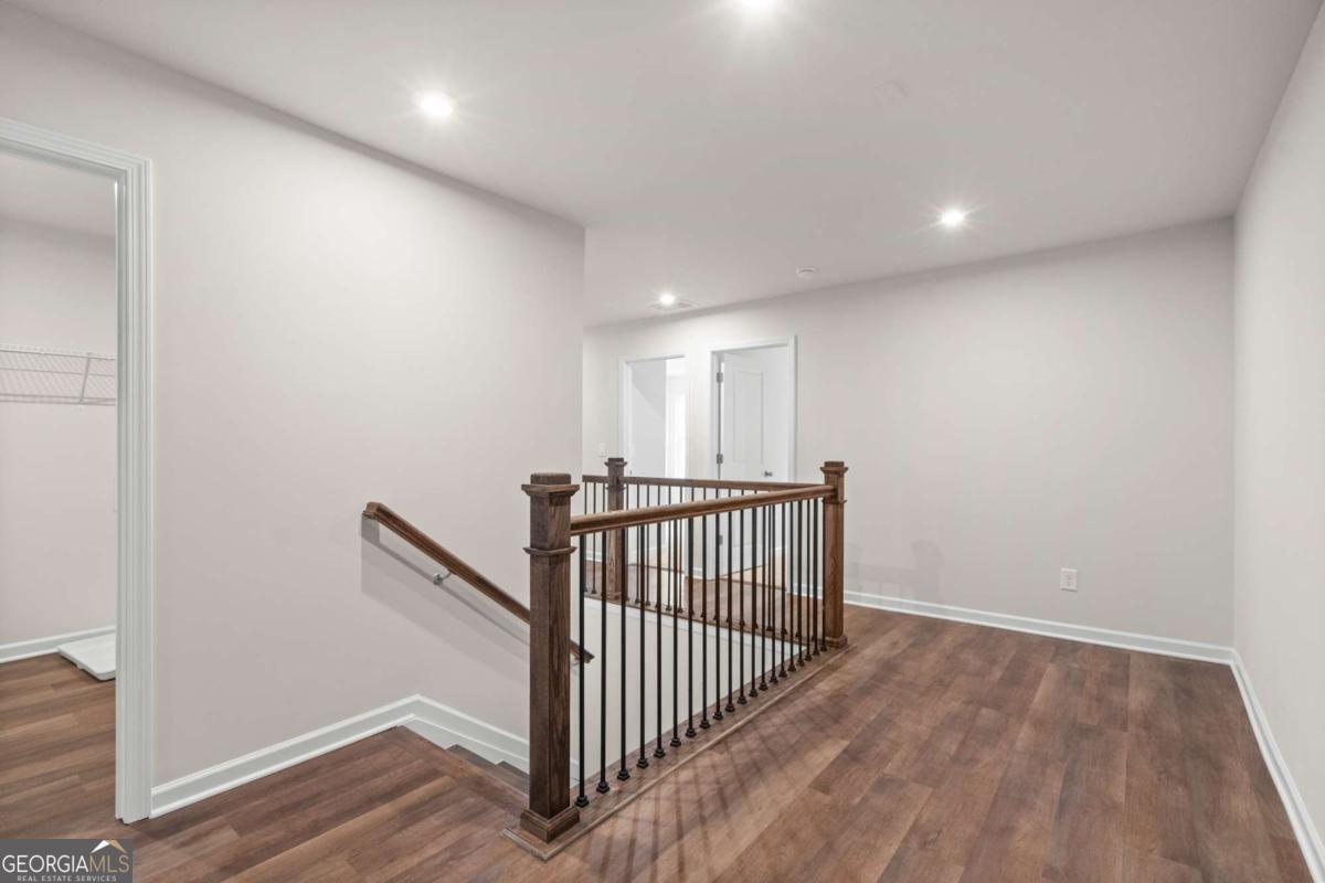 706 Smokey Quartz Way Kennesaw, GA 30144 - Photo 18 of 35 a view of a hallway