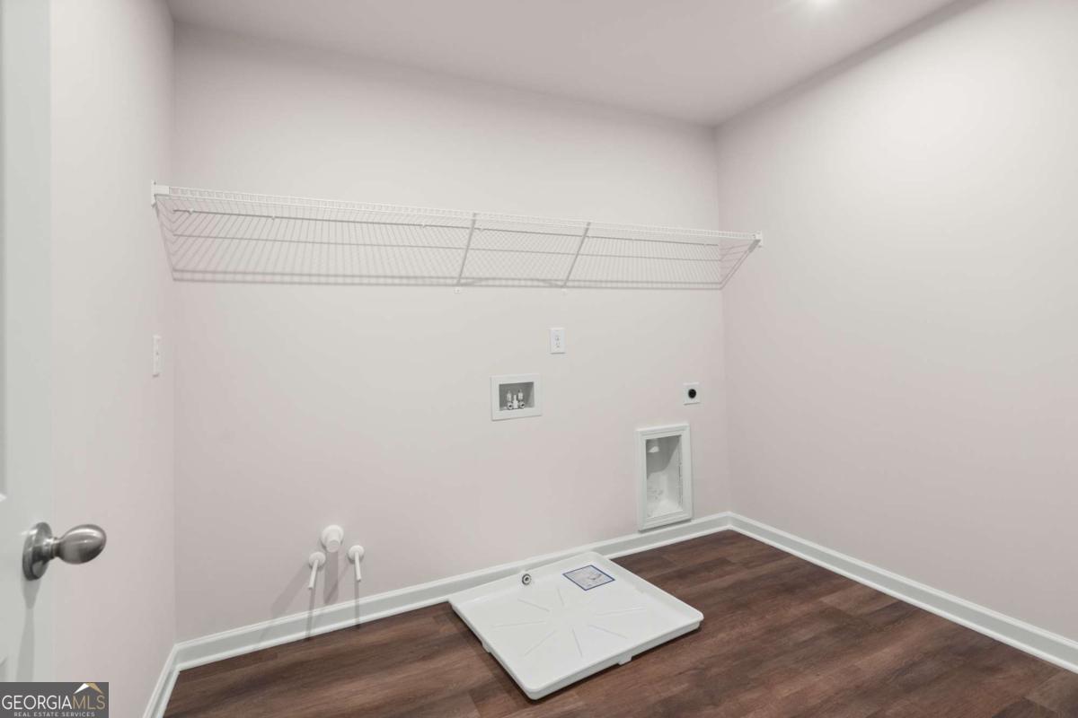 706 Smokey Quartz Way Kennesaw, GA 30144 - Photo 19 of 35 a view of room with hardwood floor