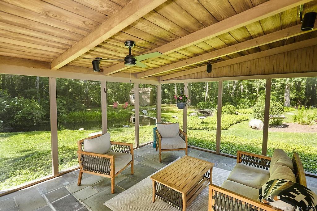 94 Partrick Road Westport, CT 06880 - Photo 15 of 17 a building outdoor space with patio furniture