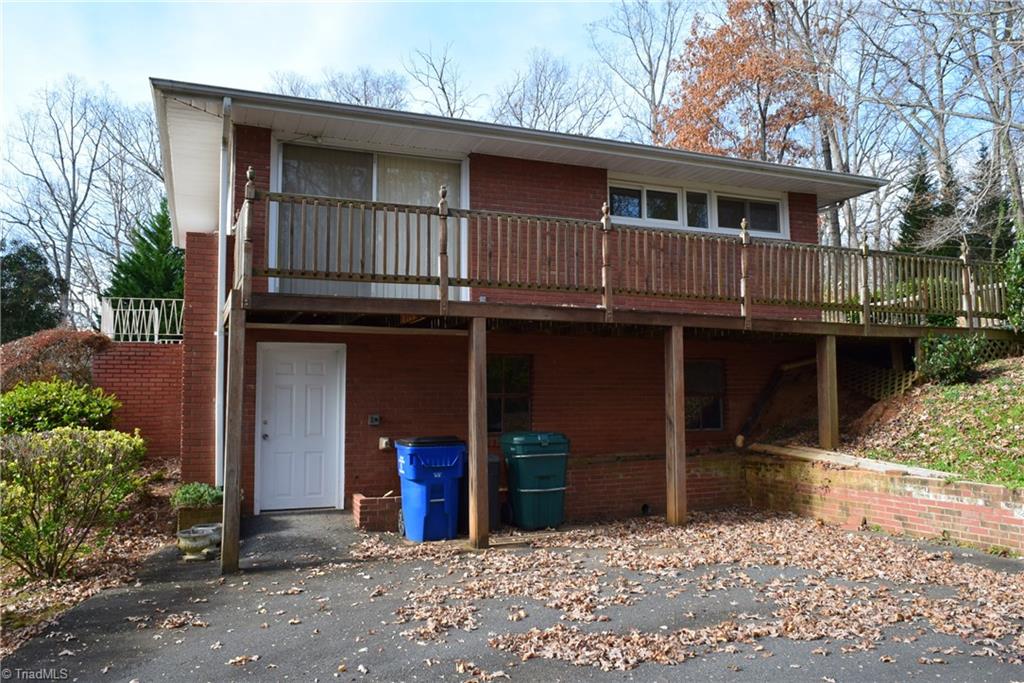 121 Oaklawn Road Mount Airy, NC 27030 - Photo 3 of 21 Right side of home. Walk in door to basement. Sliding glass doors from deck into 2nd bedroom