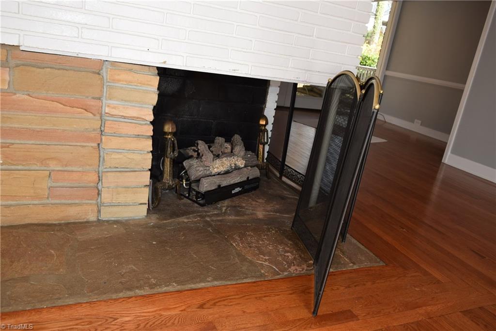 121 Oaklawn Road Mount Airy, NC 27030 - Photo 8 of 21 Gas logs in two sided / corner fire place in living room