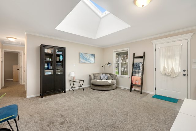 174 Queenswood Road Bolingbrook, IL 60440 - Photo 13 of 30 a living room with furniture and a area