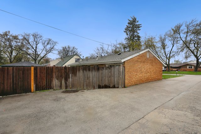 174 Queenswood Road Bolingbrook, IL 60440 - Photo 30 of 30 a view of a house with a garage
