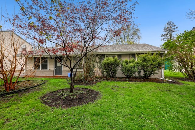 174 Queenswood Road Bolingbrook, IL 60440 - Photo 3 of 30 a front view of a house with garden