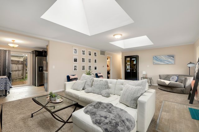174 Queenswood Road Bolingbrook, IL 60440 - Photo 10 of 30 a living room with furniture and a couch