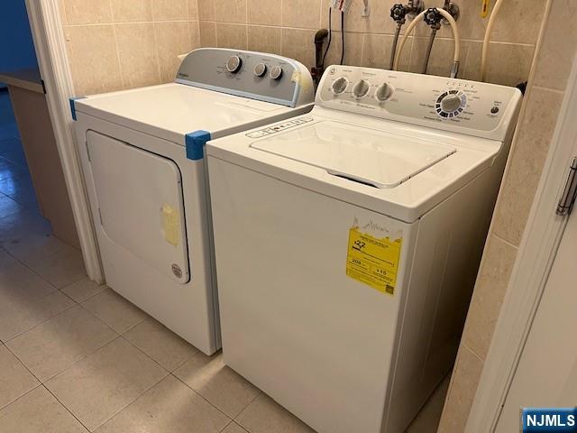 2440 B 3rd Street Fort Lee, NJ 07024 - Photo 16 of 16 a utility room with dryer and washer