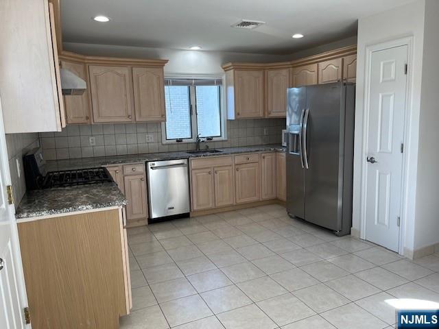 2440 B 3rd Street Fort Lee, NJ 07024 - Photo 7 of 16 a kitchen with stainless steel appliances granite countertop a refrigerator sink and cabinets