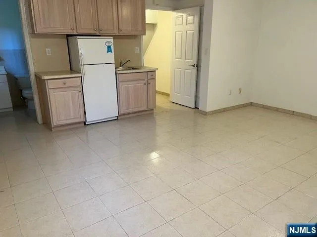 a view of a utility room with dryer and washer
