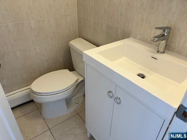 2440 B 3rd Street Fort Lee, NJ 07024 - Photo 10 of 16 a bathroom with a toilet and a sink