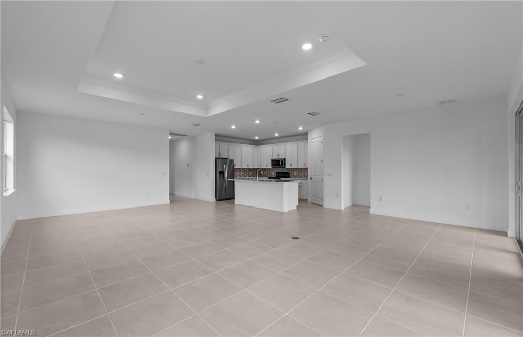 42544 Adirondack Drive Punta Gorda, FL 33982 - Photo 11 of 29 a view of kitchen with furniture and refrigerator