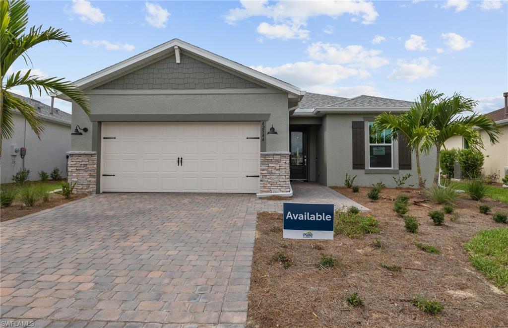 42544 Adirondack Drive Punta Gorda, FL 33982 - Photo 2 of 29 a front view of a house with a garage