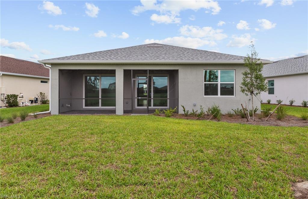42544 Adirondack Drive Punta Gorda, FL 33982 - Photo 29 of 29 a view of a house with garden