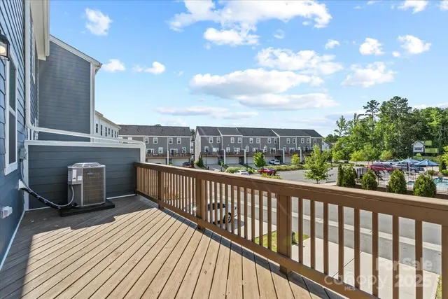 a view of balcony with furniture