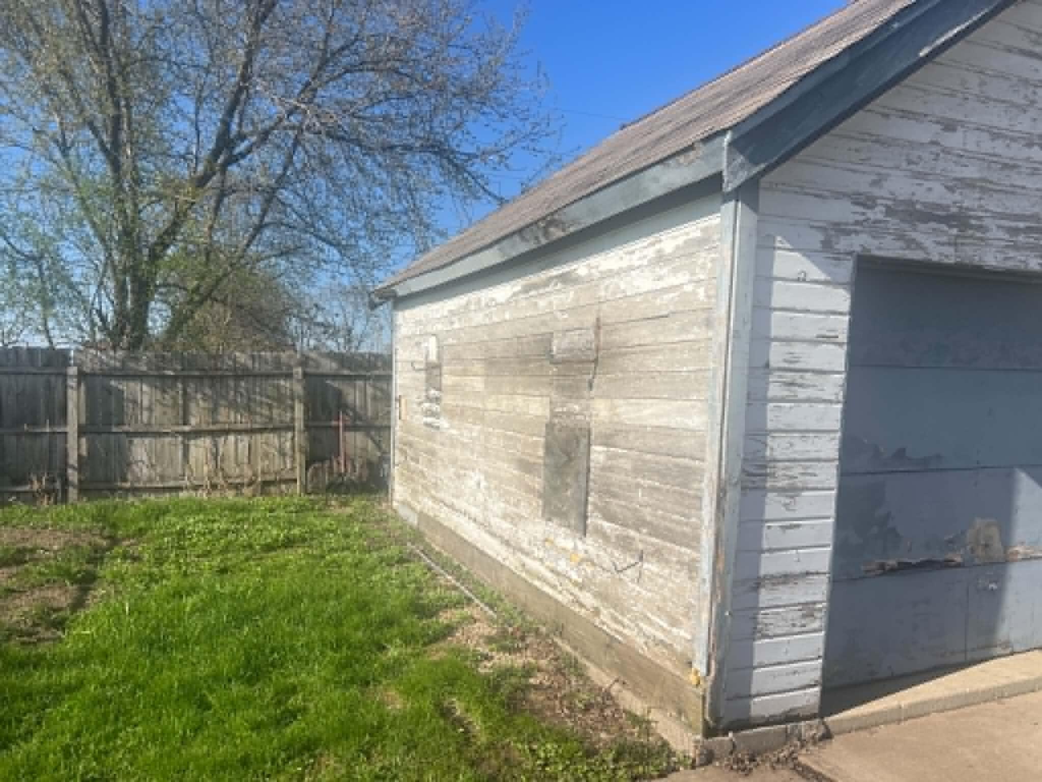 5931 North 84th Street, Unit A Milwaukee, WI 53225 - Photo 30 of 33 Garage Side