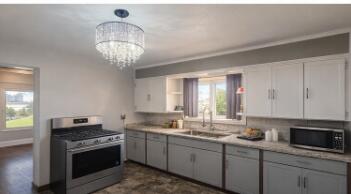 5931 North 84th Street, Unit A Milwaukee, WI 53225 - Photo 3 of 33 Digitally enhanced kitchen