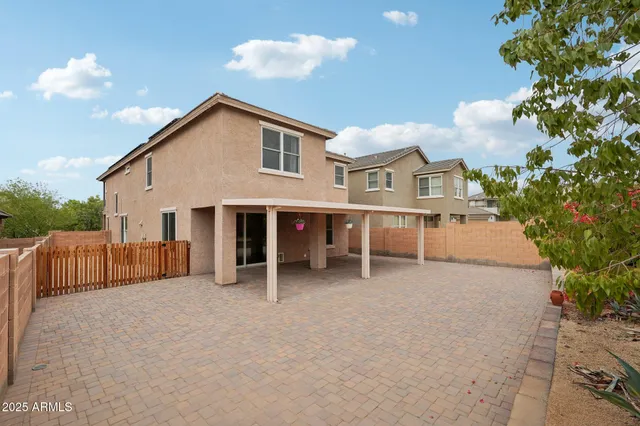 a view of a balcony with wooden floor